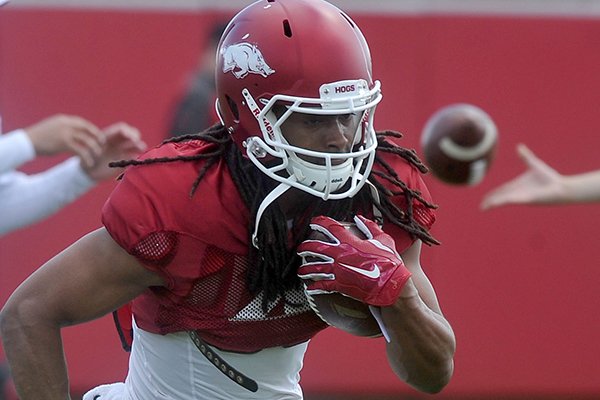 Arkansas receiver Keon Hatcher goes through practice Thursday, April 21, 2016, in Fayetteville. 