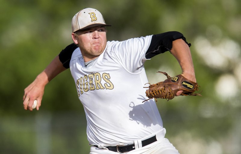 Bentonville’s Kasey Ford delivers a pitch against Fayetteville on Monday in Bentonville.