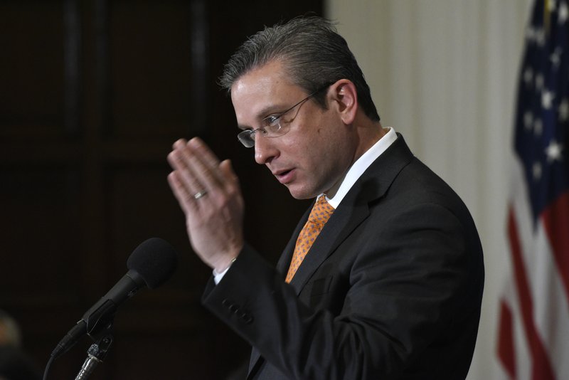 In this Dec. 16, 2015, file photo, Puerto Rico Gov. Alejandro Javier Garcia Padilla speaks at a luncheon at the National Press Club in Washington. Garcia said on Sunday, May 1, 2016, that negotiators for the U.S. territorys government have failed to reach a last-minute deal to avoid a third default and that he has issued an executive order to withhold payment. 