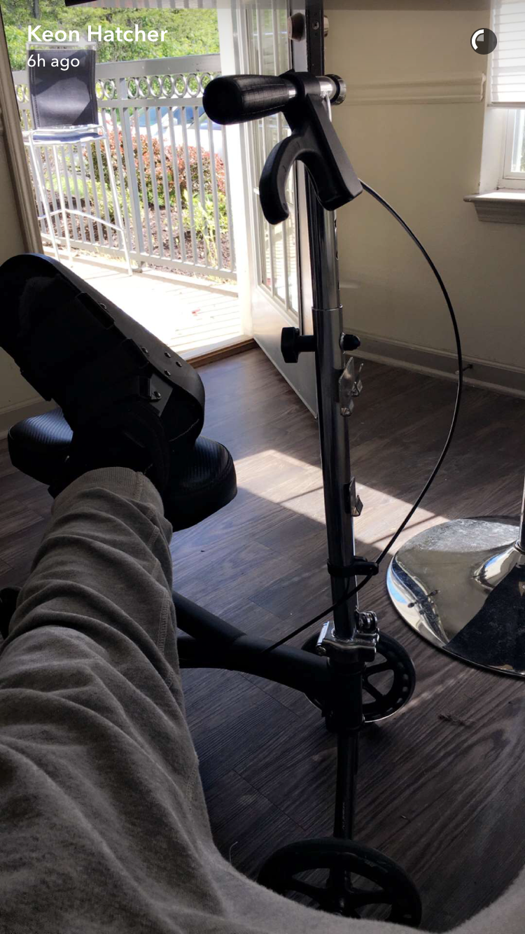 Arkansas receiver Keon Hatcher shows his foot in a boot during a Snapchat video in which he says he recently required surgery.