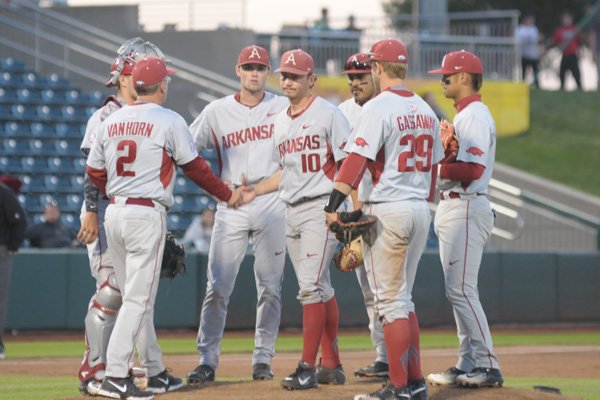 Arkansas pitcher Josh Alberius hands the ball to coach Dave Van Horn after giving up four runs without recording an out in the fifth inning of the Razorbacks' game against Missouri State on Tuesday, May 3, 2016, at Hammons Field in Springfield, Mo.