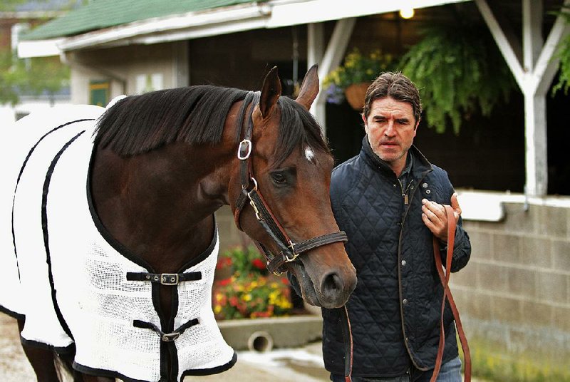 Trainer Keith Desormeaux will place his brother, jockey Kent Desormeaux, on Exaggerator (shown) during Saturday’s 142nd running of the Kentucky Derby at Churchill Downs in Louisville, Ky.