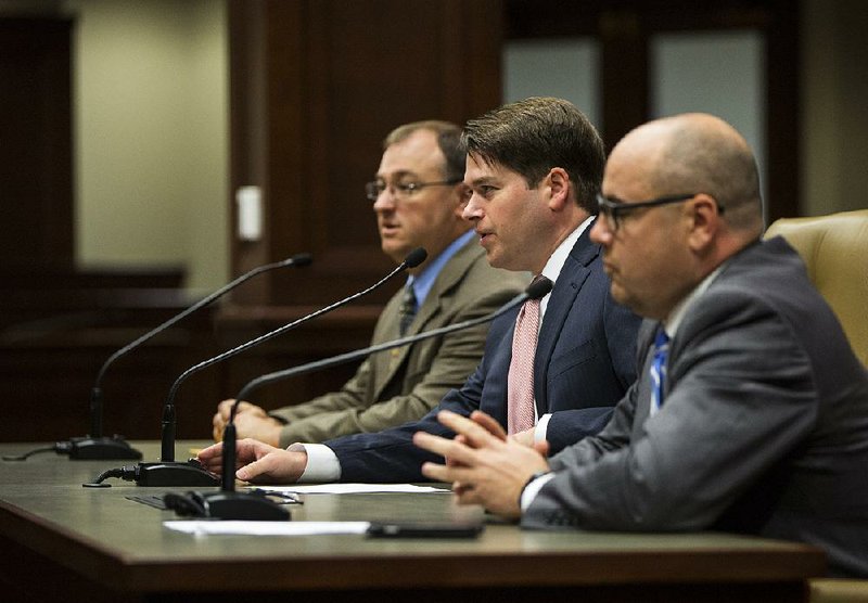 Boyd Maher (from left), director of the Capitol Zoning District, Duncan Baird, Department of Finance and Administration budget administrator, and Sen. Jeremy Hutchinson, R-Little Rock, address the Joint Budget Committee on Tuesday. 