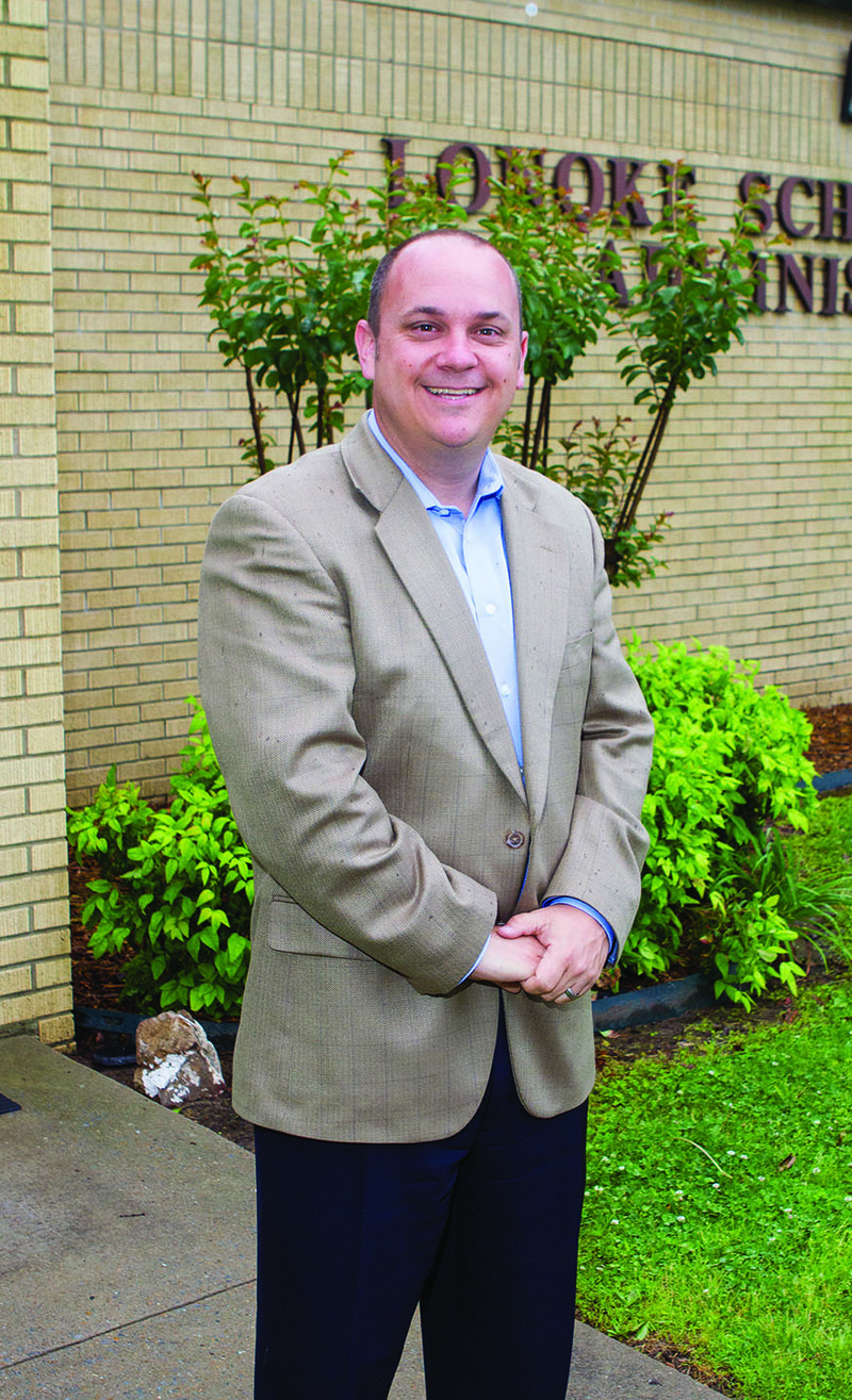 Nathan Morris, the new Two Rivers School District superintendent, stands in front of the central office for the Lonoke School District, where he is currently the director of support services, athletic director and head girls basketball coach. Morris, who has coached for 17 years, including the past 11 at Lonoke, is replacing Jim Loyd, who is retiring at the end of the school year. Morris is a 1994 graduate of Beebe High School.