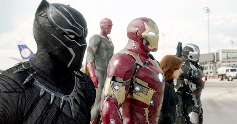 Black Panther (Chadwick Boseman), Vision (Paul Bettany), Iron Man (Robert Downey Jr.), Black Widow (Scarlett Johansson) and War Machine (Don Cheadle) mix it up in Captain America: Civil War.