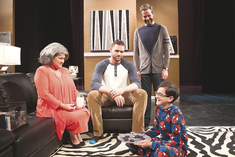   Bitter, cold and angry Katharine Gerard (played by Brenda Nemec) finds herself softening when she meets Bud (Gregory Mack), the child of her son’s ex-partner (Joseph K. Farmer, standing) and his new spouse (Nicholas Jordan) in the Arkansas Public Theatre production of “Mothers and Sons.”