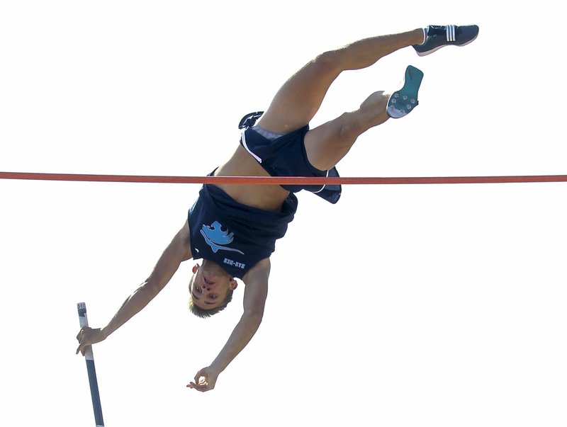 Springdale Har-Ber pole vaulter Zach McWhorter clears 16’9” Thursday on his third attempt to set a new 7A state pole vault record during the Class 7A State Track and Field Championship in Conway.