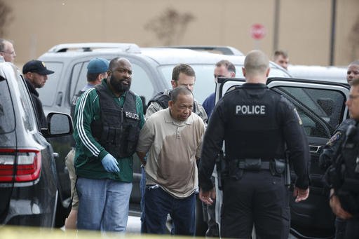 Police take Eulalio Tordil, 62, a suspect in three fatal shootings in the Washington, D.C., area into custody in Bethesda, Md., Friday, May 6, 2016.