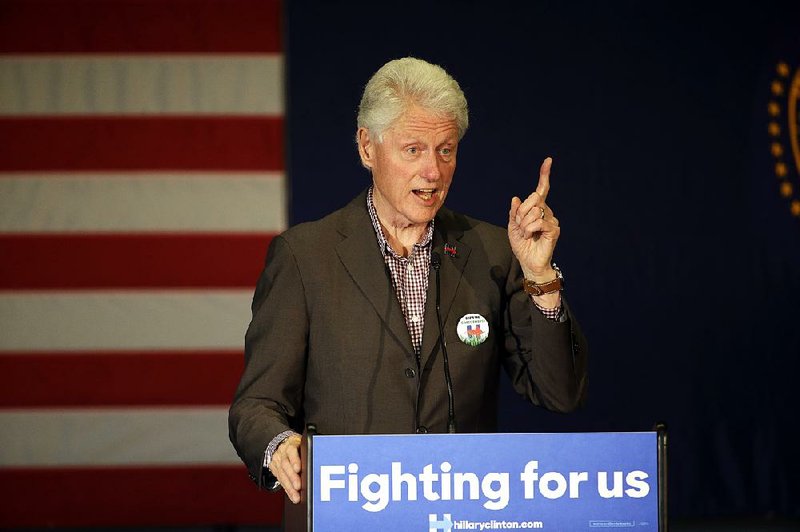 Former President Bill Clinton talks up his wife, Democrat Hillary Clinton, at a campaign stop in Portland, Ore. 