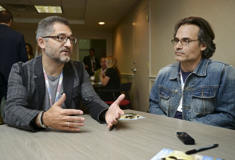 George Stephanopoulos (left), producer of Swing Away, and Michael Nickles, the film’s director, speak with the press Friday during the filmmakers roundtable at the Four Points by Sheraton in Bentonville.