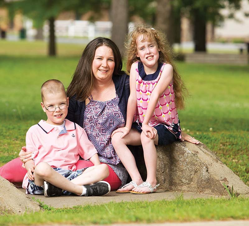 Candyce Allen takes a break to sit with her 8-year-old twins, Kenneth and Chloe, in Heber Springs. The children were born at 25 weeks, along with their sister, Cara, who died in Arkansas Children’s Hospital in Little Rock at 10 1/2 months old. Allen and her husband, Greg, established the Cara Allen Diamond Award at the hospital for outstanding patient and family-centered care.
