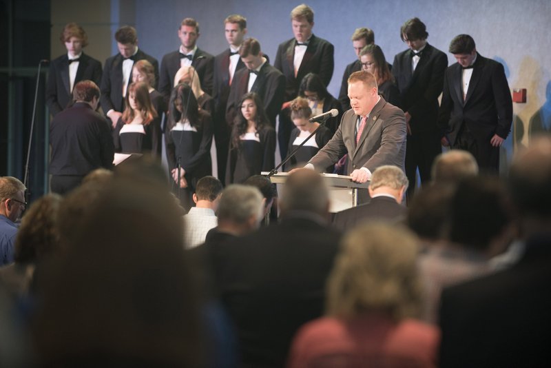 Rogers Mayor Greg Hines leads a prayer during the 2016 Rogers Mayor’s Prayer Breakfast for National Day of Prayer at Cross Church in Rogers. The first call to prayer was made in 1775, when the Continental Congress asked the colonies to pray for wisdom in forming a nation.