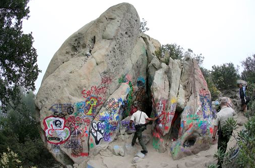  Corral Canyon Cave, better known by the misleading moniker "Jim Morrison Cave," was was closed to the public until further notice. Large crowds have shown up on a daily basis to see the often vandalized cave and add to the vandalism with graffiti of their own. 