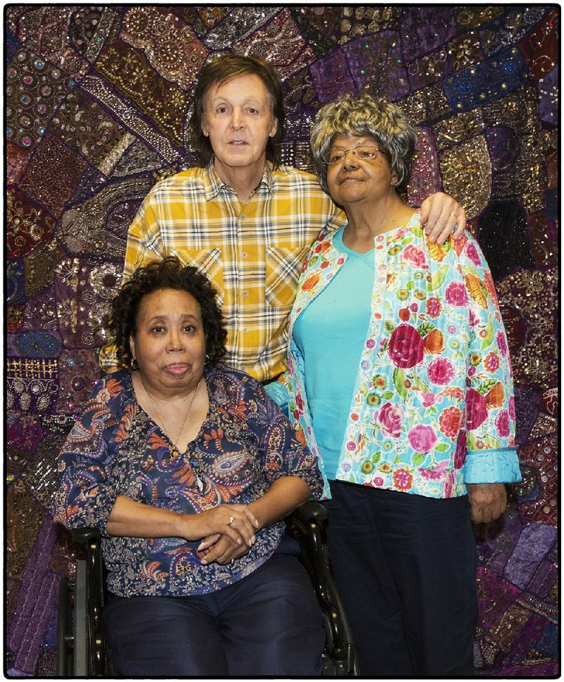 Paul McCartney with Thelma Mothershed Wair (left) and Elizabeth Eckford.