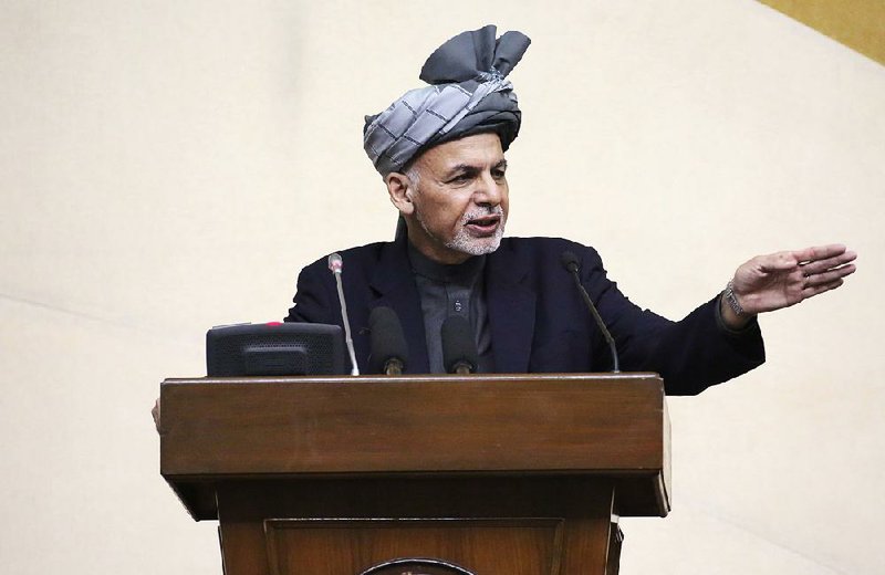 In this photo released by Afghanistan's Presidential Palace, President Ashraf Ghani speaks during a joint meeting of the National Assembly in Kabul, Afghanistan, Monday, April 25, 2016.  