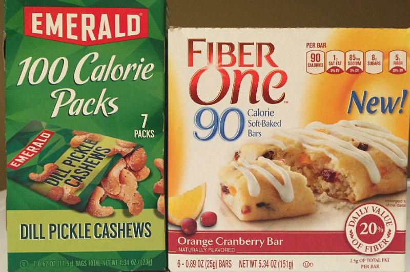 Emerald dill pickle cahsews 100 calorie packs and Fiber One orange cranberry  bar