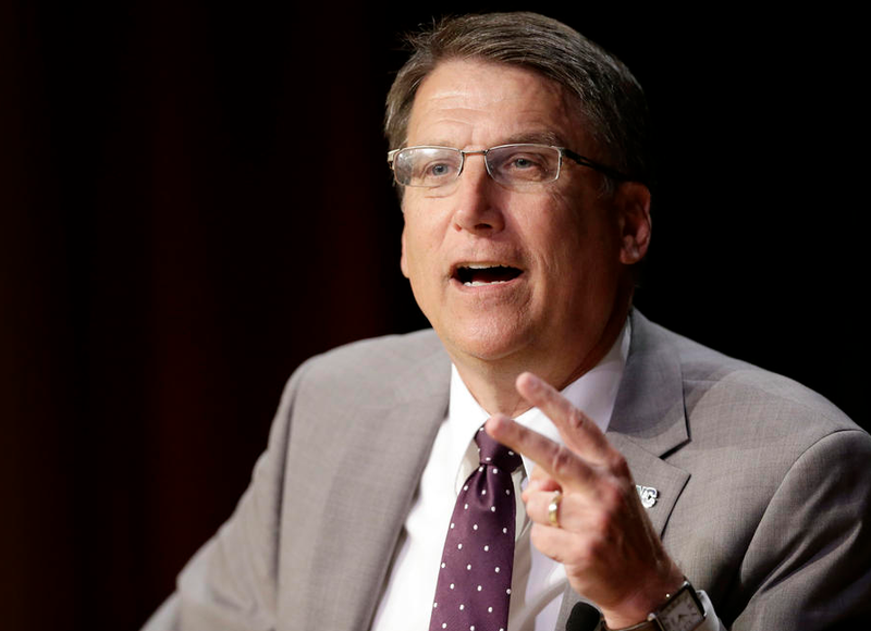 In this May 4, 2016, file photo, North Carolina Gov. Pat McCrory makes remarks concerning House Bill 2, which limits protections to LGBT people, while speaking during a government affairs conference in Raleigh, N.C. 