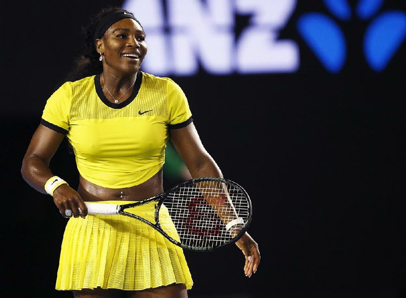 In this Jan. 28, 2016, file photo, Serena Williams smiles during her semifinal match against Agnieszka Radwanska of Poland at the Australian Open tennis championships in Melbourne, Australia. 