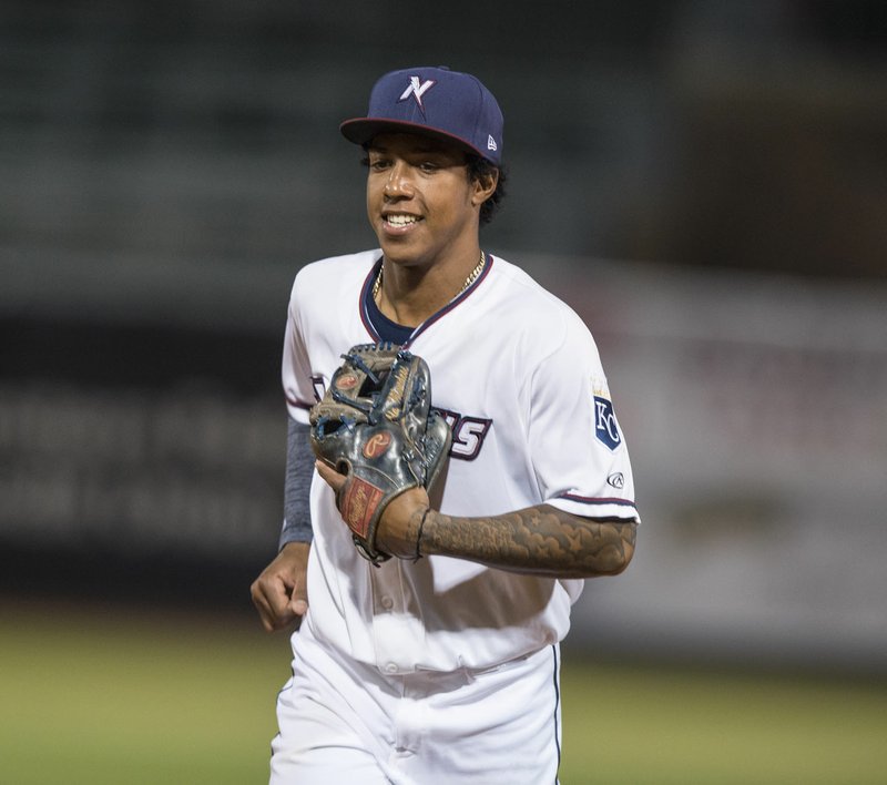 Raul Mondesi of the Northwest Arkansas Naturals runs back to the dugout April 21 at Arvest Ballpark in Springdale. Major League Baseball suspended Mondesi for 50 games on Tuesday for testing positive for clenbuterol.