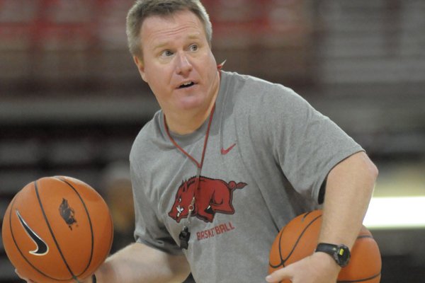 Arkansas assistant coach Matt Zimmerman leads a drill Saturday, Oct. 24, 2015, during practice in Bud Walton Arena. 