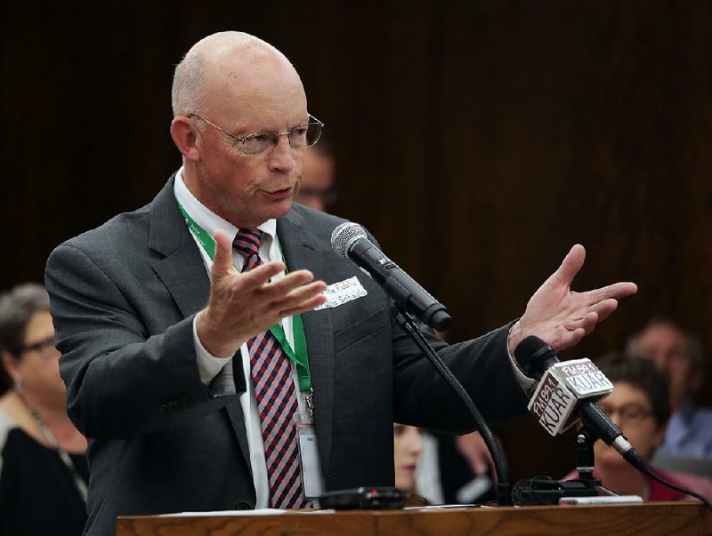 Little Rock School District Superintendent Baker Kurrus gives Arkansas Board of Education members a progress report Thursday on the state-run school system. 