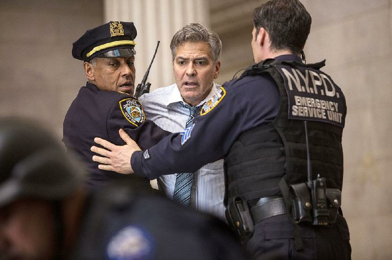 George Clooney plays a financial program host on TV whose show gets hijacked by an armed gunman during a live broadcast in Jodie Foster’s Money Monster.
