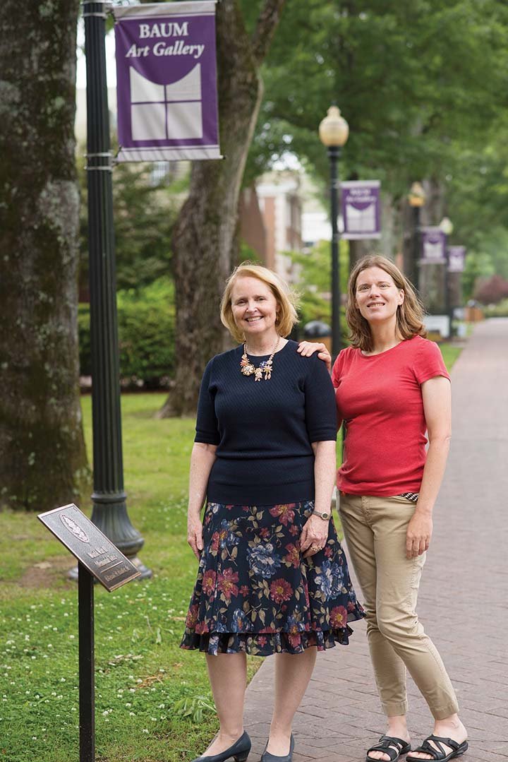 Gayle Seymour, left, associate dean of the University of Central Arkansas College of Fine Arts and Communication and chairwoman of the Public Art Committee, led the initiative to install bronze plaques on 47 World War II Memorial Trees on campus. Also pictured is Donna Bowman, a professor in the Schedler Honors College, who had her students create a website devoted to the UCA alumni who died during the war. The website launched in April.