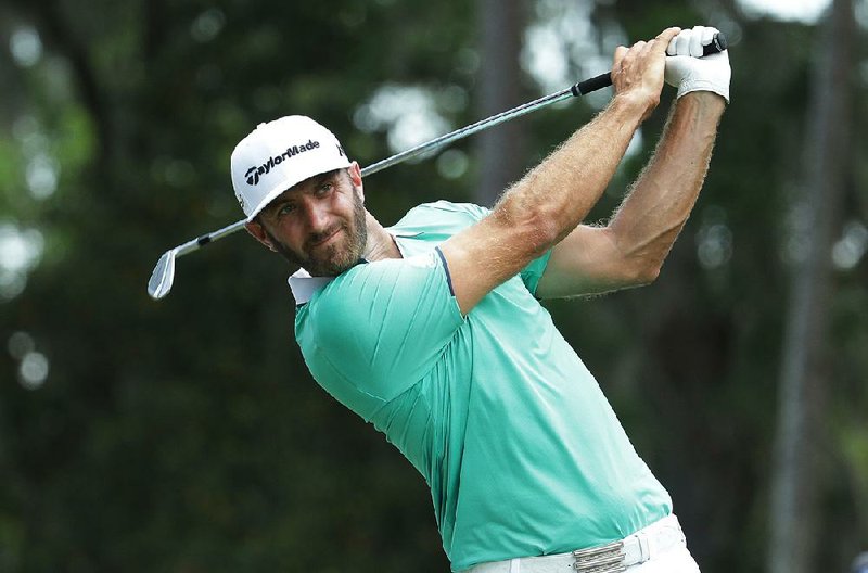 Dustin Johnson lost control of his ball when flipping it to his brother, but his brother is the one who got wet.