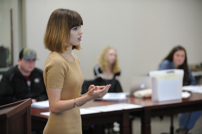 Sheridan Ellis, a senior member of the Har-Ber High School Mock Trial team, questions a witness Tuesday during practice at the school in Springdale. The team is traveling to Boise, Idaho, to represent Arkansas in the National High School Mock Trial Championship.