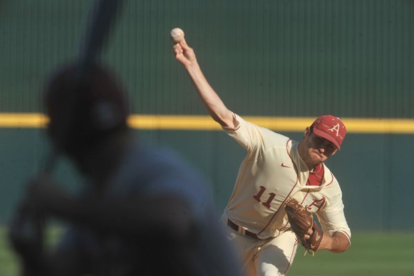 Arkansas pitcher Keaton McKinney fires a pitch in the first inning Saturday, May 14, 2016, during the Razorbacks' game against Alabama at Baum Stadium in Fayetteville.