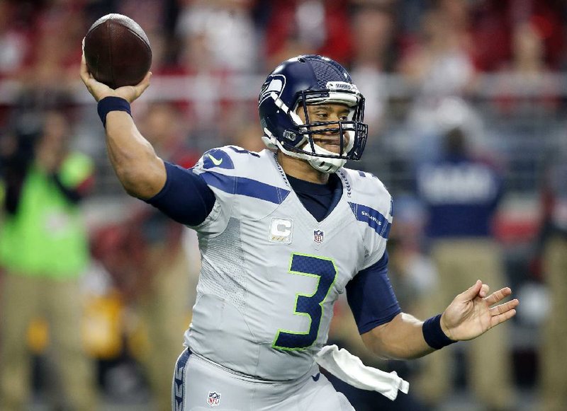 Seattle Seahawks quarterback Russell Wilson says he doesn’t have any warm feelings toward former North
Carolina State coach Tom O’Brien, who said he would not be able to play quarterback in the NFL.