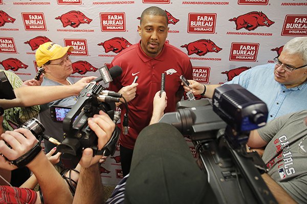 Arkansas assistant coach Scotty Thurman speaks to reporters Thursday, May 12, 2016, at Bud Walton Arena in Fayetteville. 