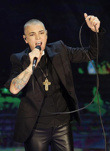 In this Oct. 5, 2014 file photo, Irish singer Sinead O'Connor performs during the Italian State RAI TV program "Che Tempo che Fa", in Milan, Italy. 