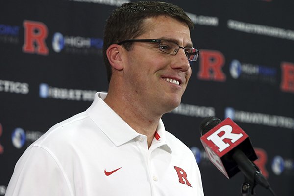 In this Jan. 12, 2016, file photo, Rutgers football coach Chris Ash speaks to reporters in Piscataway, N.J. Even as he climbed the ranks to become the defensive coordinator for a national championship team, Ash still wondered if his stay-out-of-the-spotlight style would hold him back. (Mark R. Sullivan/Asbury Park Press via AP, File)