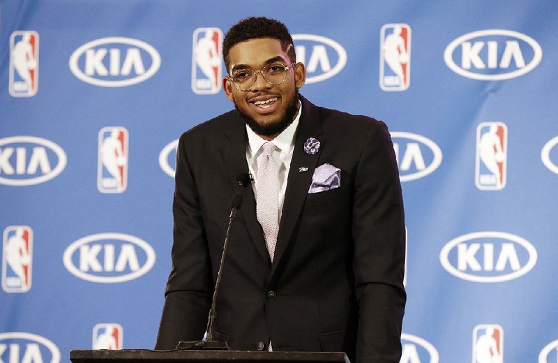 Minnesota forward Karl-Anthony Towns talks to members of the media during a news conference Monday after he was named the NBA Rookie of the Year.