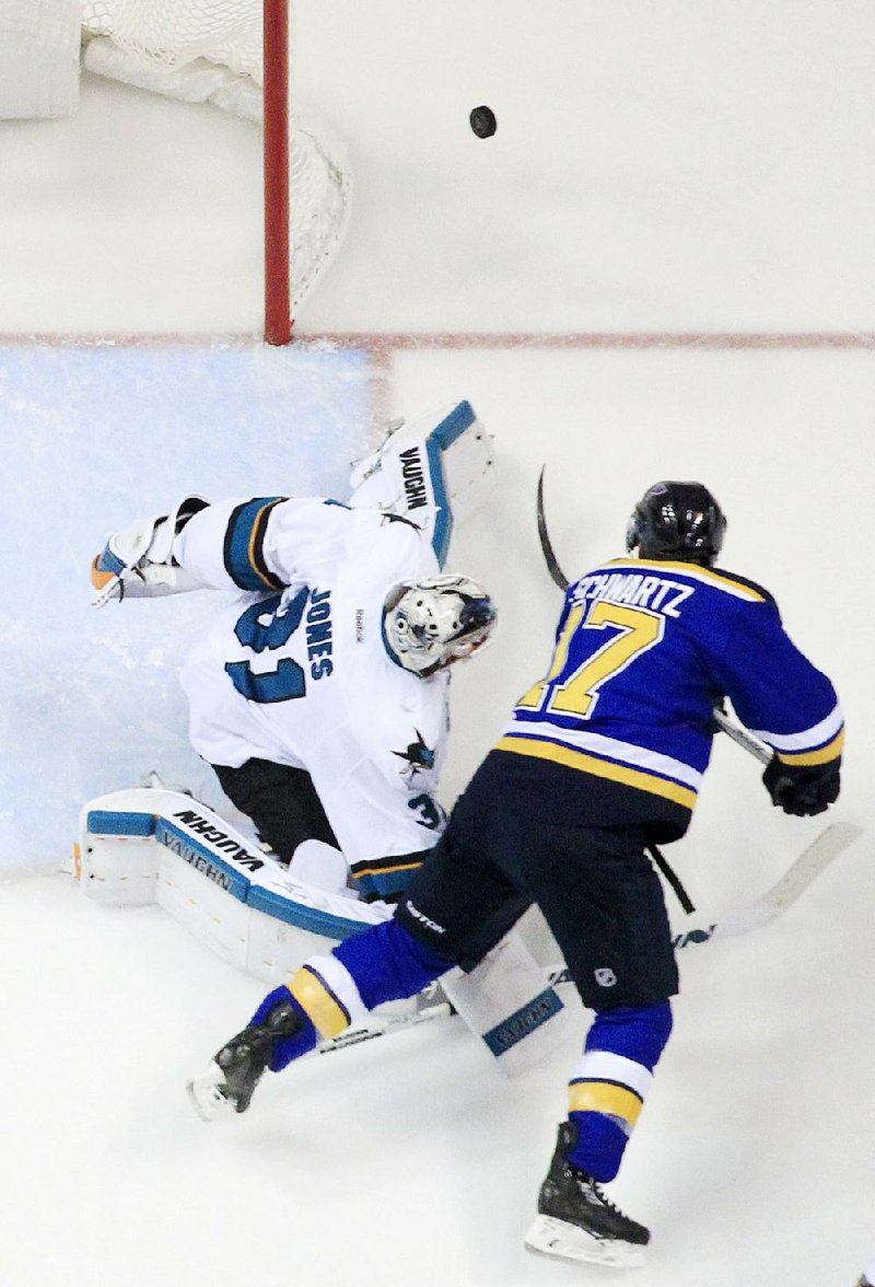 San Jose Sharks goalie Martin Jones (31) defends the goal against St. Louis Blues left wing Jaden Schwartz during the second period of the Sharks’ 4-0 victory in the NHL playoffs Tuesday night in St. Louis. The series is now tied at 1-1 with Game 3 Thursday night in San Jose.