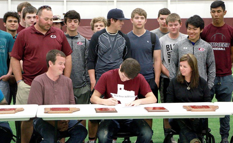 Photo by Patrick Lanford Wyatt Clark, center, accompanied by his parents, Coach Justin Ledbetter and Gentry team members, signed a letter of intent on May 4 to bowl at West Texas A&amp;M in Canyon, Texas, next year.