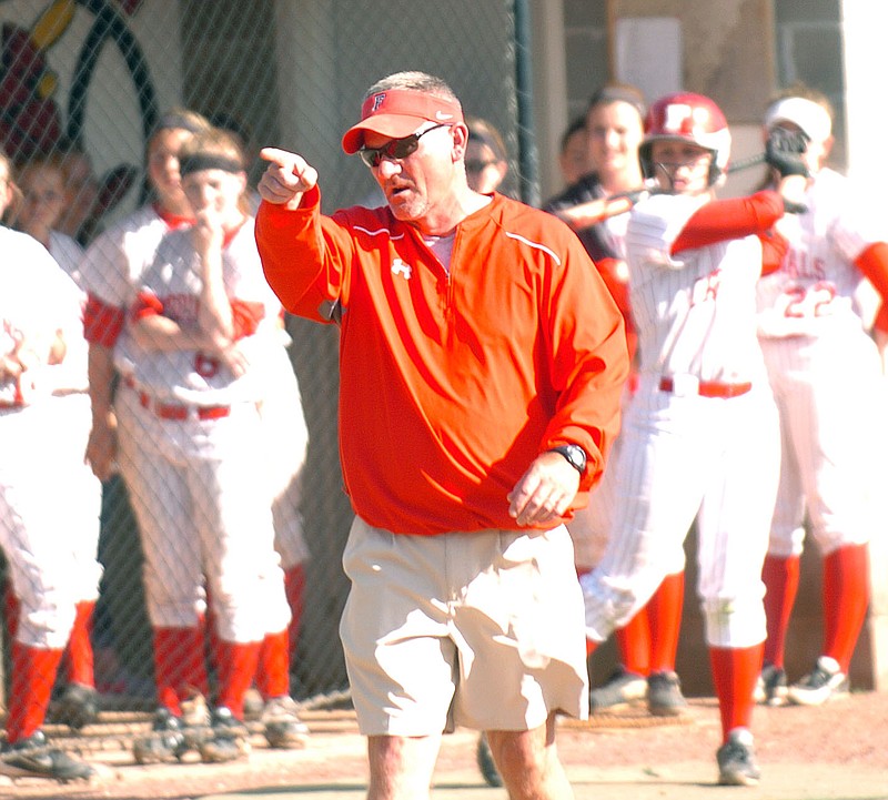 MIKE CAPSHAW ENTERPRISE-LEADER Coach Randy Osnes has built Farmington into one of the top softball programs in the state. The Lady Cardinals should be strong again next season with many key players returning.