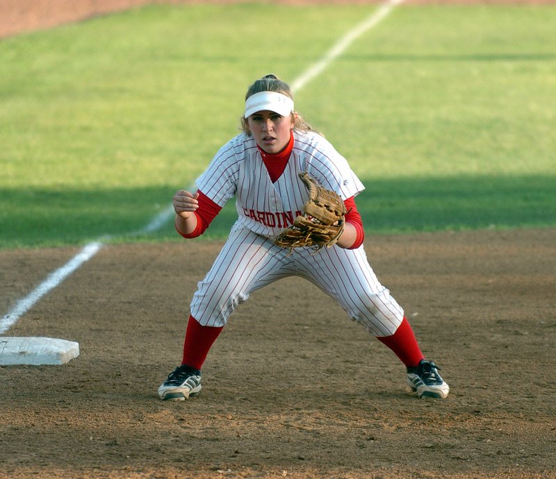 MIKE CAPSHAW Enterprise-Leader Farmington junior third baseman Brandy Wallace readies April 12 to field hits during the Lady Cardinals&#8217; doubleheader sweep against Morrilton.