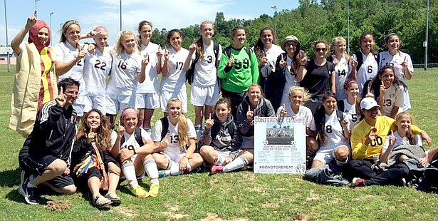 Submitted Photo The Gentry High School girls&#8217; soccer team, together with head coach Fabrizio Campagnola, pose for a team photo last week. They play won the opening state tournament games and play for the state championship on Saturday.