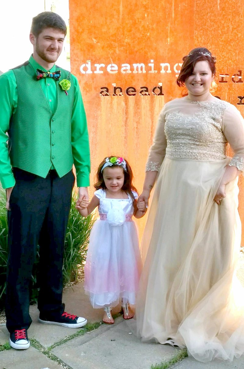 Randall and Amanda Thompson with their daughter, Leia.