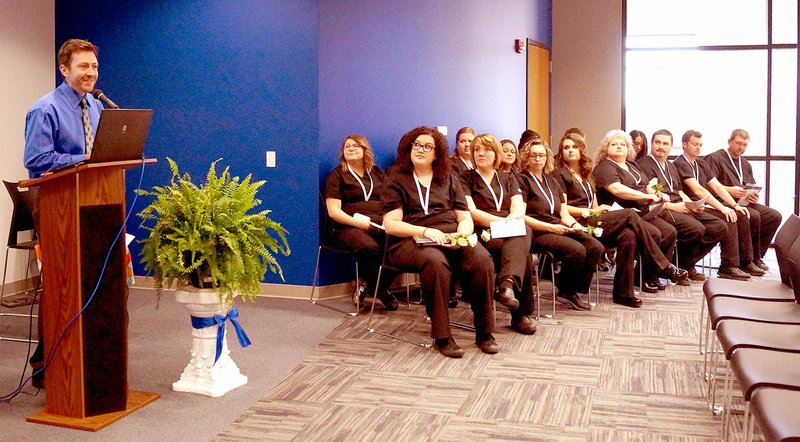 Rita Greene/McDonald County Press Aaron Divine, McDonald County Campus Director, Crowder College addressed the nursing class of 2016 and guests at the presentation of pins ceremony Thursday, May 12.