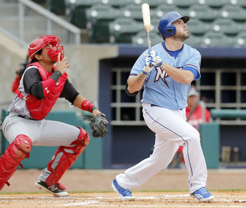 Kansas City Royal Mike Moustakas hits Wednesday for the Northwest Arkansas Naturals against the Arkansas Travelers at Arvest Ballpark in Springdale. Moustakas is playing with the Naturals as he goes through rehabilitation. The Northwest Arkansas Naturals hosted school-age children from around the area for Kids Day. The Naturals lost 2-1.