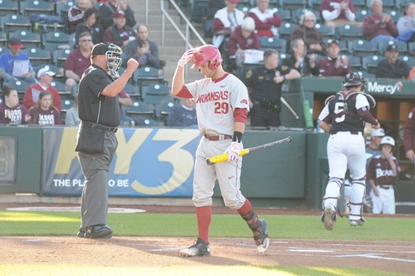 Arkansas' Cullen Gassaway walks back to the dugout after striking out against Missouri State on Tuesday, May 3, 2016, at Hammons Field in Springfield, Mo.