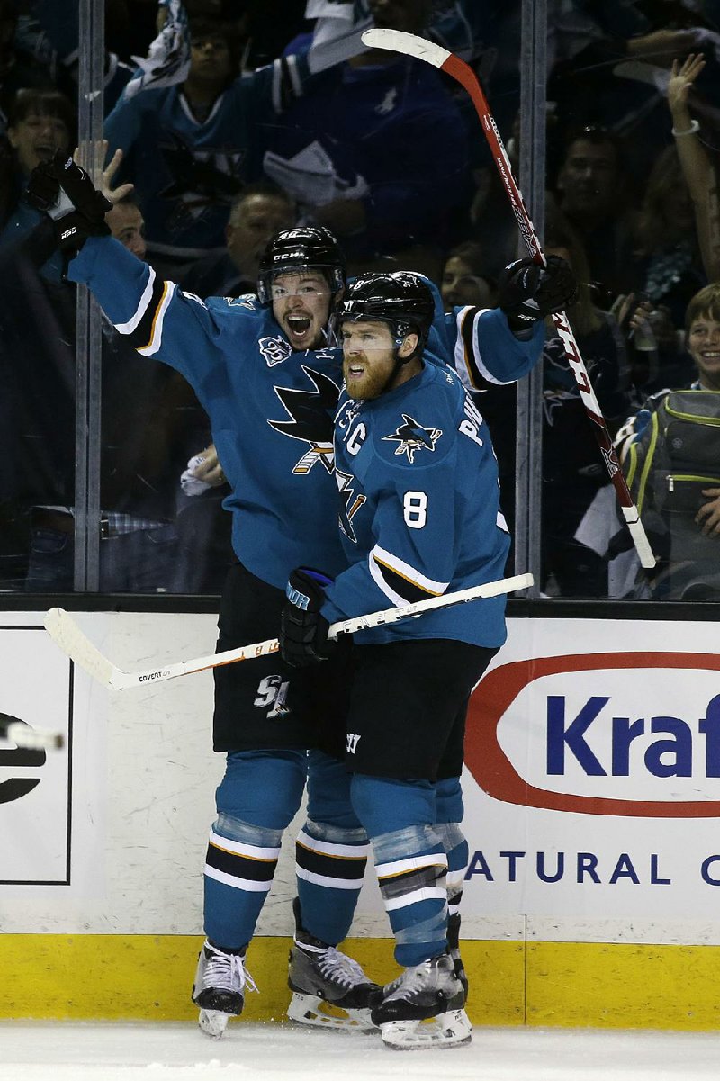 Tomas Hertl (left) of the San Jose Sharks celebrates his goal with teammate Joe Pavelski during Thursday night’s victory over the St. Louis Blues.