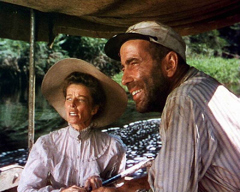 Gin-swilling riverboat pilot Charlie Allnut (Humphrey Bogart) and straight-laced missionary Rose Sayer (Katharine Hepburn) discover an affinity for each other in John Huston’s The African Queen.