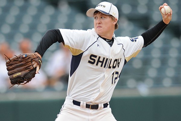 Shiloh Christian starter Gunner Gilbert delivers a pitch against Ashdown Friday, May 20, 2016, during the Class 4A state championship game at Baum Stadium in Fayetteville.