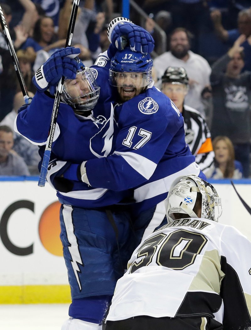 Tampa Bay Lightning's Tyler Johnson, left, celebrates his goal with teammate Alex Killorn (17), next to Pittsburgh Penguins goalie Matt Murray (30) during the second period of Game 4 of the NHL hockey Stanley Cup Eastern Conference finals Friday, May 20, 2016, in Tampa, Fla. 