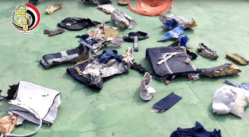 Video posted Saturday on the official Facebook page of the Egyptian Armed Forces spokesman shows what officials said were personal items and other wreckage from the downed EgyptAir jetliner.