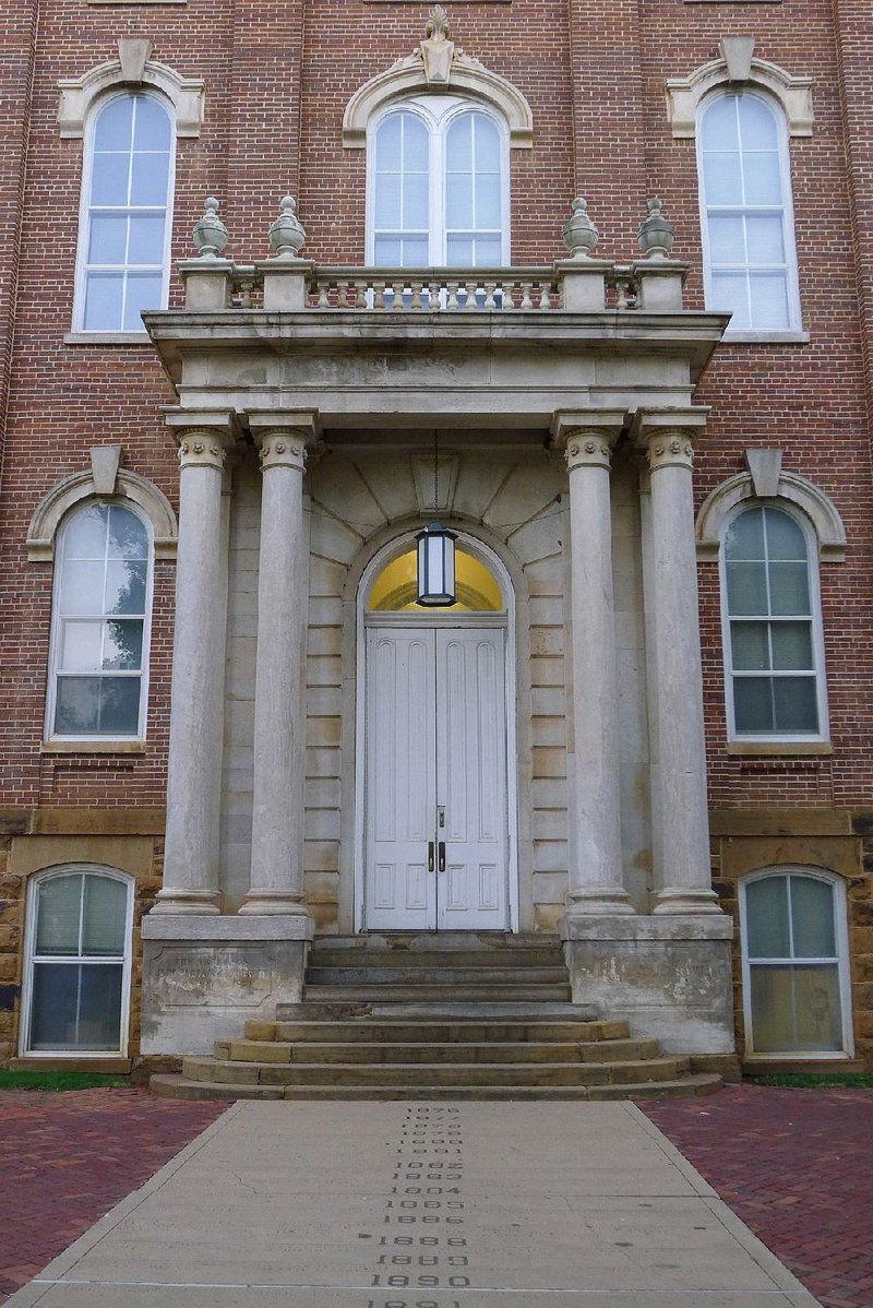 Workers will restore the 1875 entryway of Old Main, the oldest building on the University of Arkansas campus in Fayetteville, shown here in this 2015 photo. 